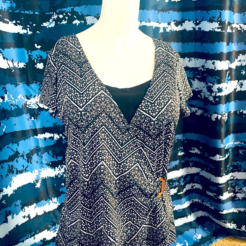 Flattering Black And Gold Blouse With Gold Buckle.